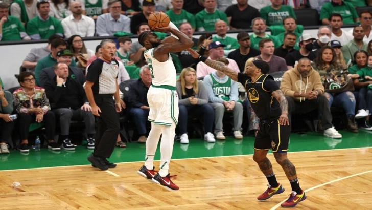 Jaylen Brown Boston Celtics shoots against Gary Payton of Golden State Warriors